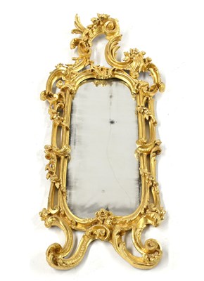 Lot 404 - A George III carved wood and gilt gesso pier...
