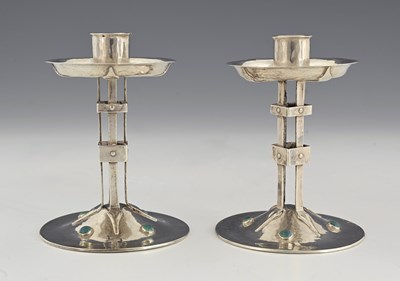 Lot 88 - A E Jones, a pair of Arts and Crafts silver...