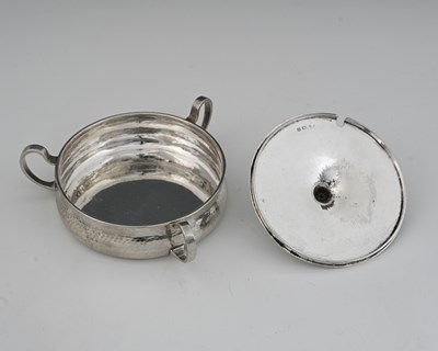 Lot 87 - A E Jones, an Arts and Crafts silver three...