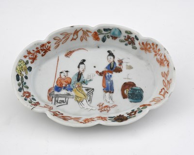 Lot 652 - A Chinese polychrome porcelain spoon tray,...