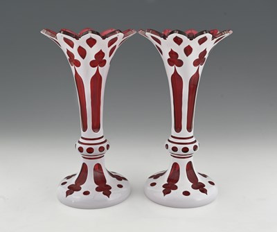 Lot 396 - A pair of Bohemian cased glass vases, footed...
