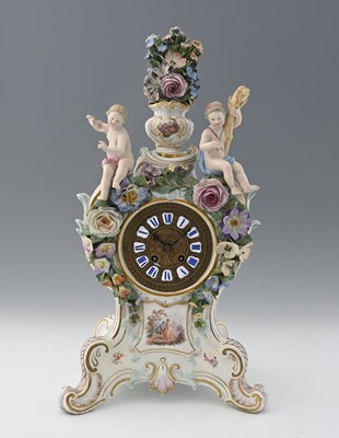 Lot 565 - A Meissen florally encrusted figural clock,...