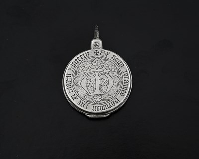 Lot 549 - Edward Pugin, a small silver hinged locket,...