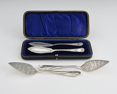 Lot 16 - A pair of Victorian silver butter spades, with...