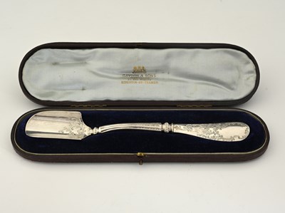 Lot 9 - A late Victorian silver cheese scoop, with...