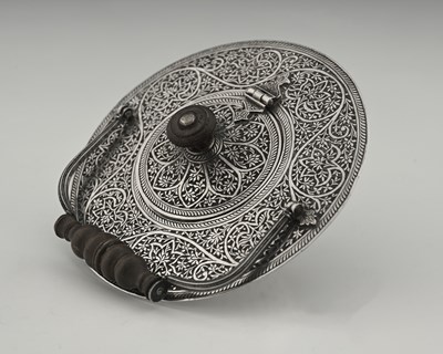Lot 145 - Indian Colonial, a tea or milk strainer, the...