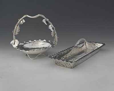 Lot 784 - Hukin and Heath, a grape stand, with hammered...