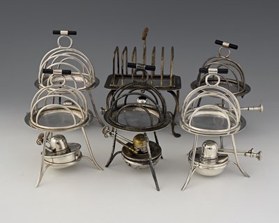 Lot 725 - Asprey, six toast racks, with warming stand...