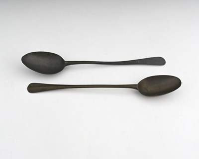 Lot 592 - A brass basting spoon, circa 1730, together...