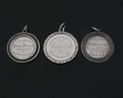 Lot 700 - Three Victorian silver school prize medals, to...