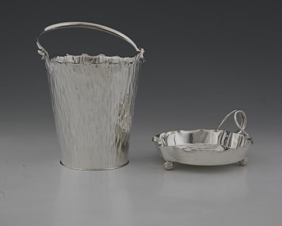 Lot 737 - Hukin and Heath, two naturalistic hammered...