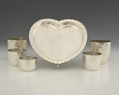 Lot 750 - Hukin and Heath, five hammered beakers,...