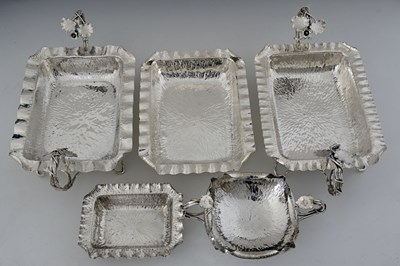 Lot 786 - Hukin and Heath, five silverplated hammered...