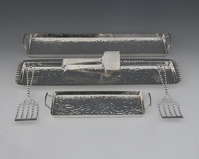 Lot 790 - Hukin and Heath, three electroplated hammered...