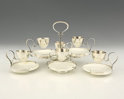 Lot 734 - Hukin and Heath, a silver-plated and ceramic...