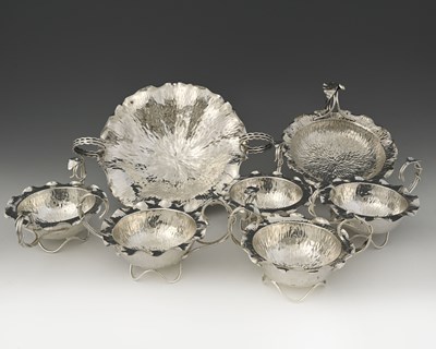 Lot 797 - Hukin and Heath, a group of silver-plated...