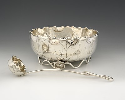 Lot 796 - Hukin and Heath, a large round Lotus dish...