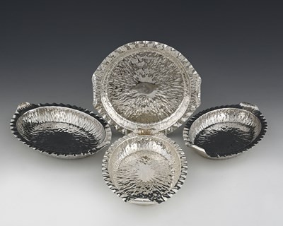 Lot 772 - Hukin and Heath, four naturalistic 'hammered'...