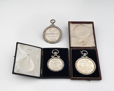 Lot 692 - Three Victorian silver prize medals for 'The...