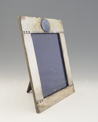 Lot 111 - An Arts and Crafts silvered metal and Ruskin...