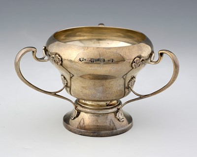 Lot 51 - An Arts and Crafts silver three handled vase,...