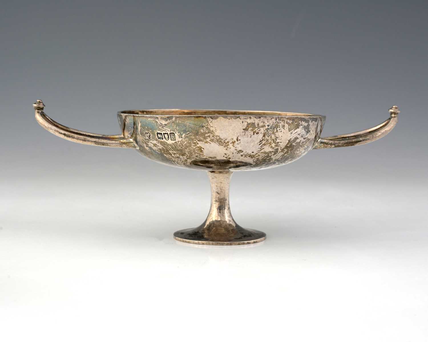 Lot 50 - An Arts and Crafts silver revivalist pedestal...