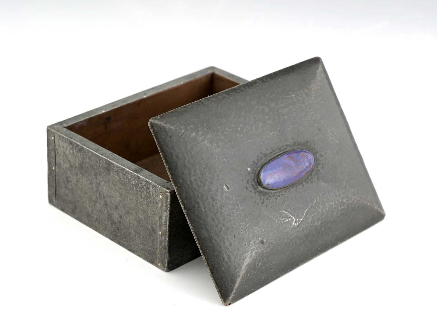 Lot 100 - An Arts and Crafts pewter and Ruskin set box,...