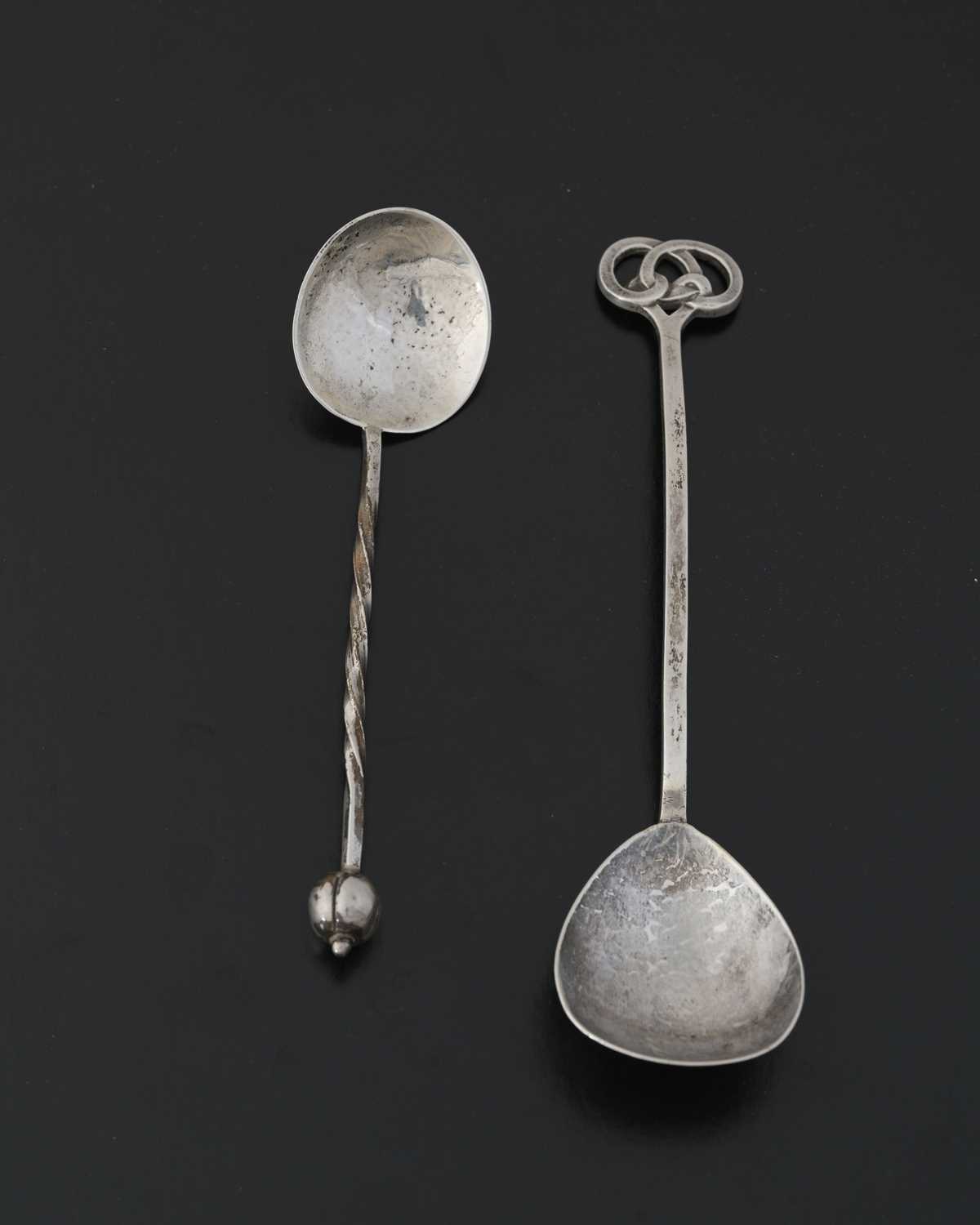 Lot 48 - A E Jones, two Arts and Crafts silver spoons,...