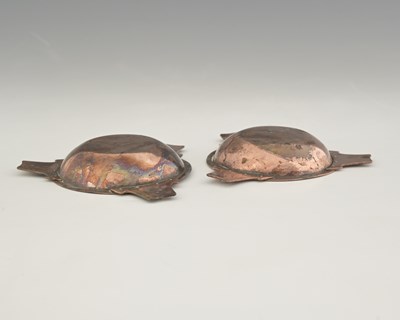 Lot 96 - A E Jones, a pair of Arts and Crafts silver...