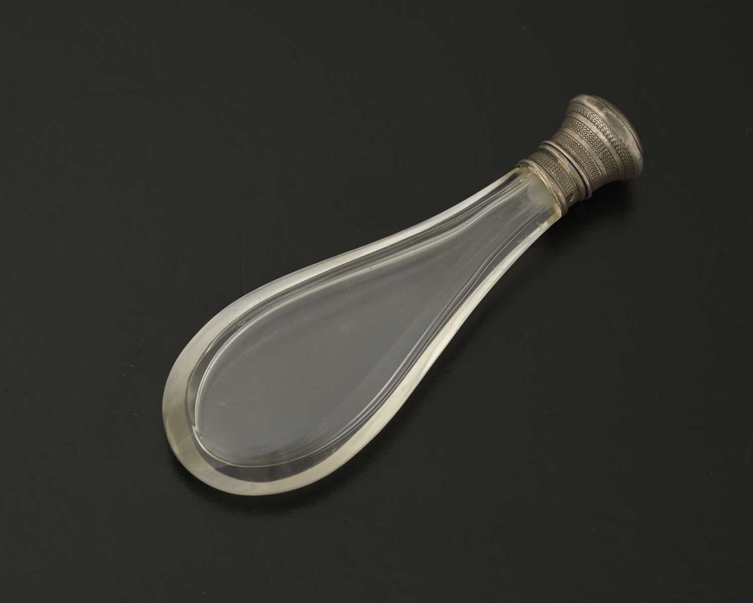 Lot 43 - A French silver mounted glass perfume bottle,...