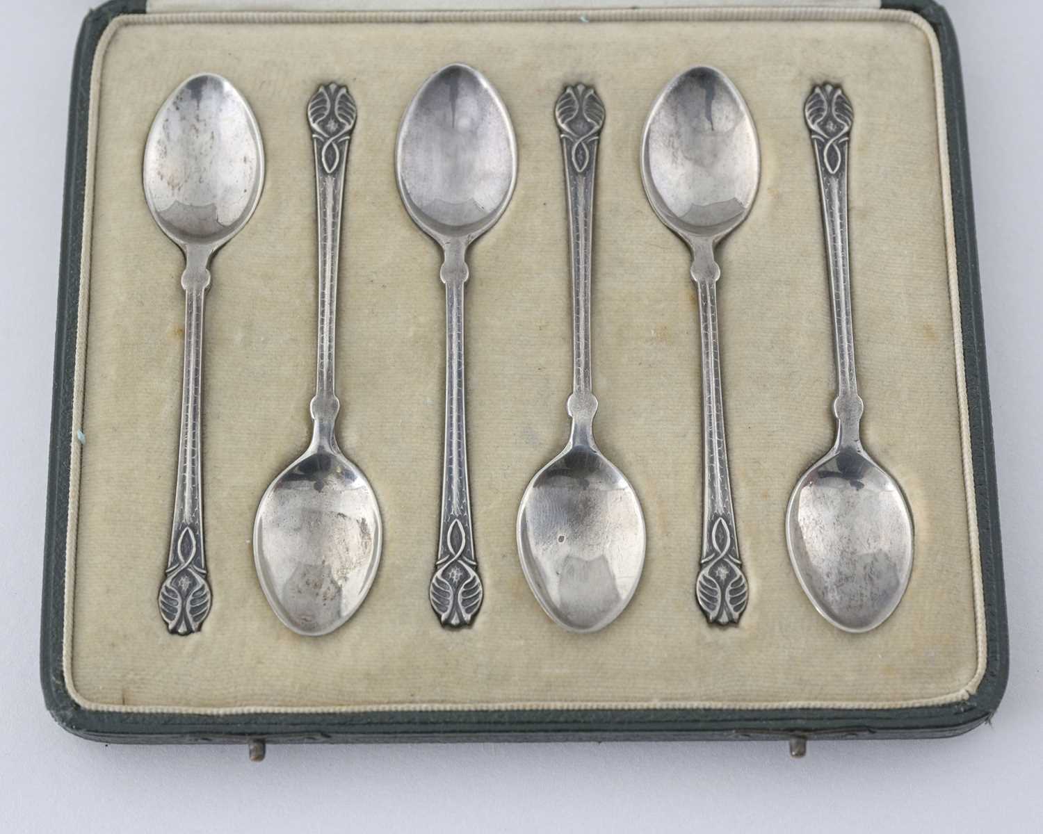 Lot 73 - Liberty and Co, a cased set of six Arts and...