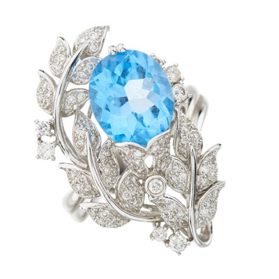 Lot 146 - An 18ct gold blue topaz and diamond foliate cocktail dress ring