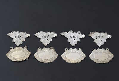 Lot 261 - Eight Elizabeth II silver wine labels or...