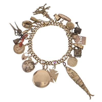 Lot 103 - An early to mid 20th century 14ct gold diamond and ruby curb-link charm bracelet