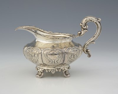 Lot 171 - An Irish Victorian silver milk jug, the...