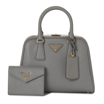 Lot 477 - Prada, a Pyramid Frame handbag w/ purse.