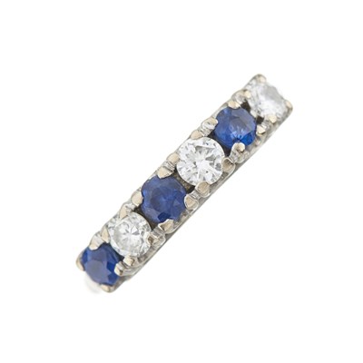 Lot 214 - An 18ct gold sapphire and diamond six-stone ring