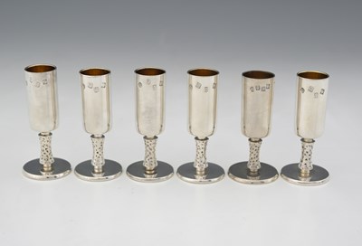 Lot 225 - A set of six Elizabeth II silver novelty tot...