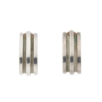Lot 496 - Tiffany & Co., a pair of silver grooved hoop earrings.