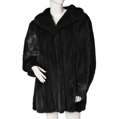 Lot 531 - Saga, a three-quarter length dark ranch mink coat.