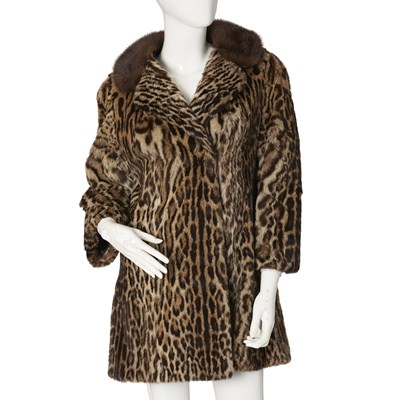 Lot 534 - An ocelot and mink fur jacket.