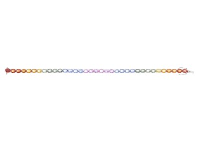 Lot 69 - An 18ct gold harlequin sapphire line bracelet