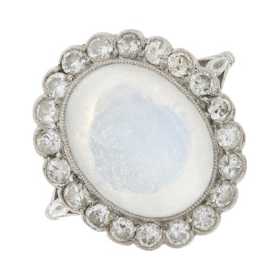 Lot 127 - An Art Deco platinum moonstone and diamond cluster ring