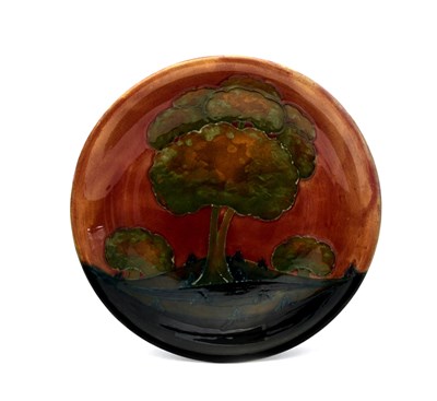 Lot 678 - 'Eventide' a Moorcroft Pottery plate designed...