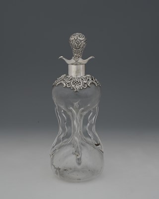 Lot 92 - A Victorian silver-mounted glass decanter and...