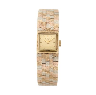 Lot 250 - Bueche Girod, a tri-colour 9ct gold bracelet watch