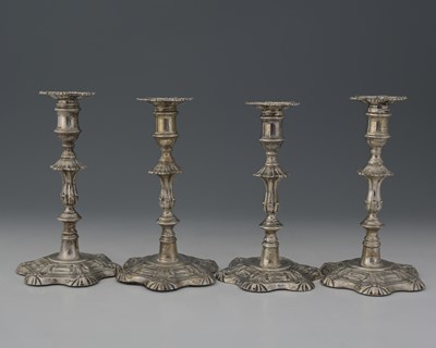 Lot 121 - Two pairs of William IV silver candlesticks,...