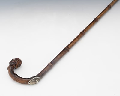 Lot 202 - A bamboo cane horse measuring stick with root...