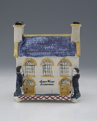 Lot 825 - A Mexborough Prattware Pottery money box,...