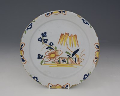 Lot 801 - A London Delft polychrome plate, circa 1750s,...